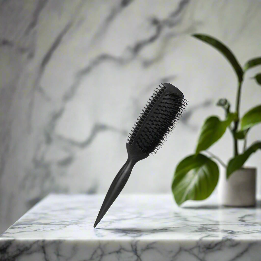 Brosse à cheveux bouclés DefBoucles noir cheveux frisés femme
