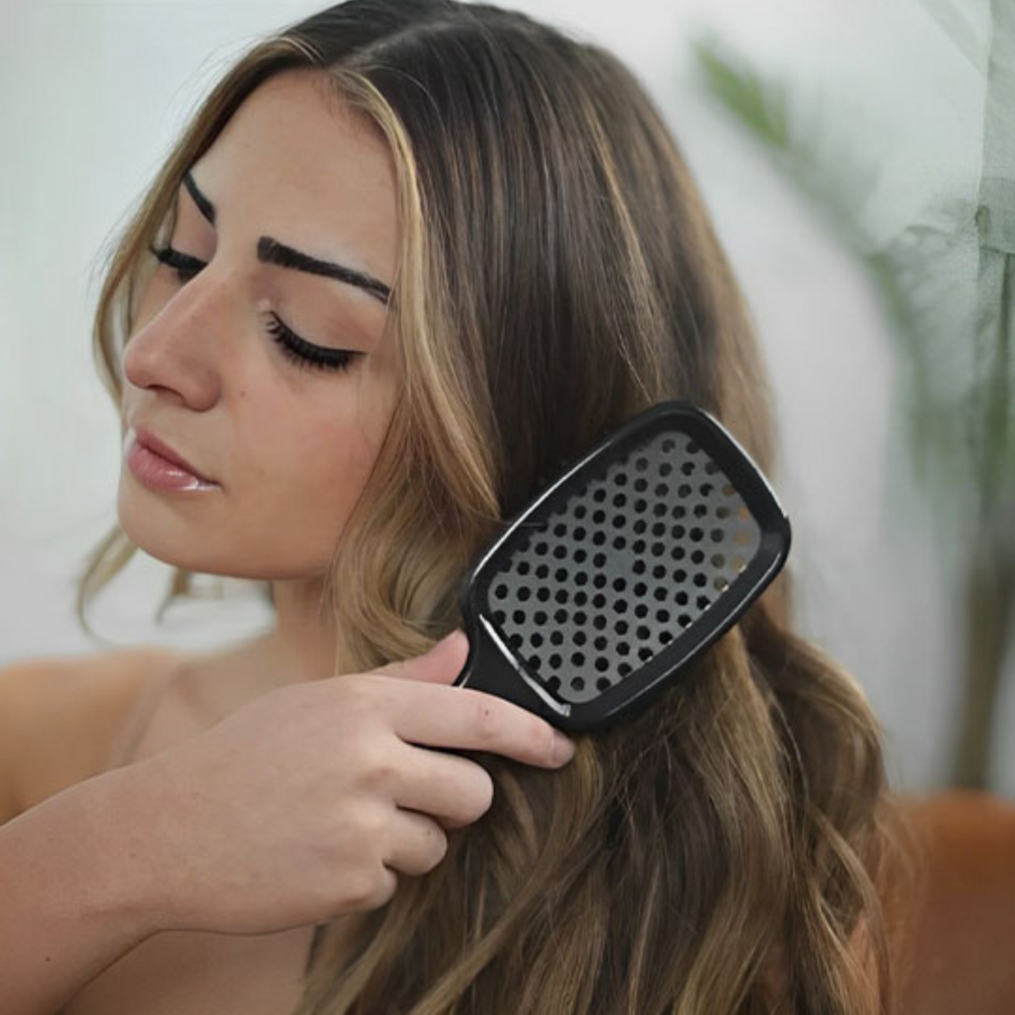 brosse-cheveux-easydetangle-brosse-démêlante-noir-cheveux-bouclés