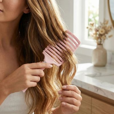 brosse à cheveux airflow rose cheveux bouclés démêlage ondulés bouclés